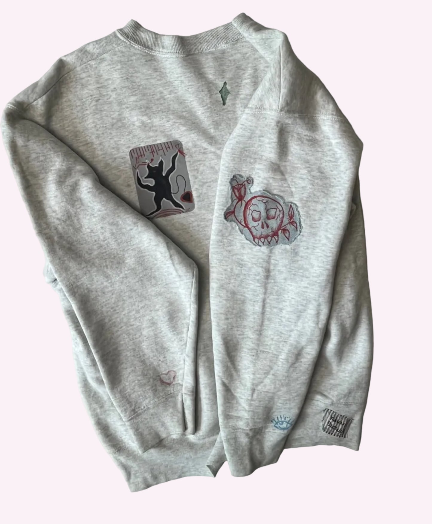 patched & printed pullover
