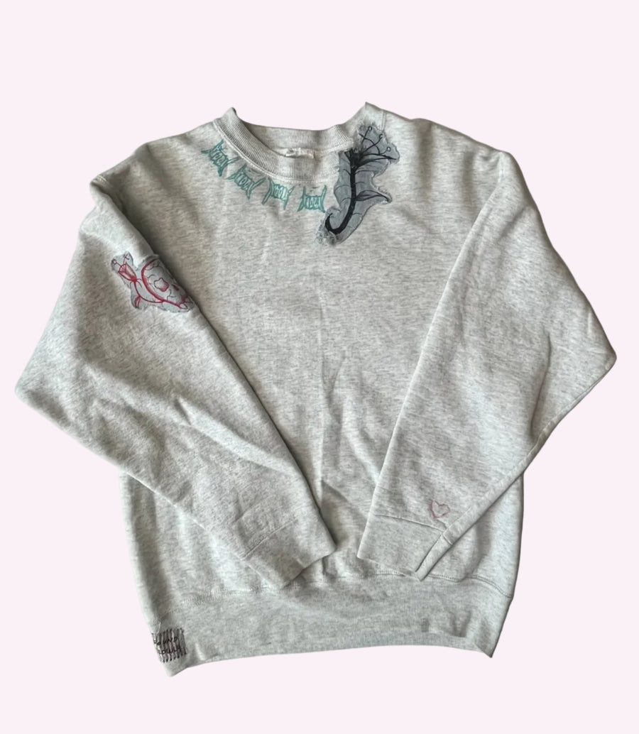 patched & printed pullover